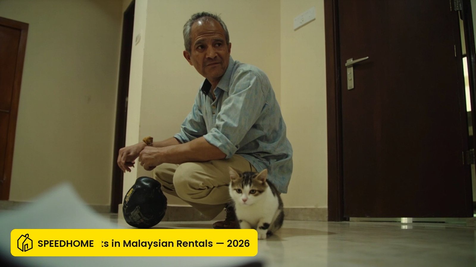 Tenant with cat in a tiled Malaysian apartment rental interior