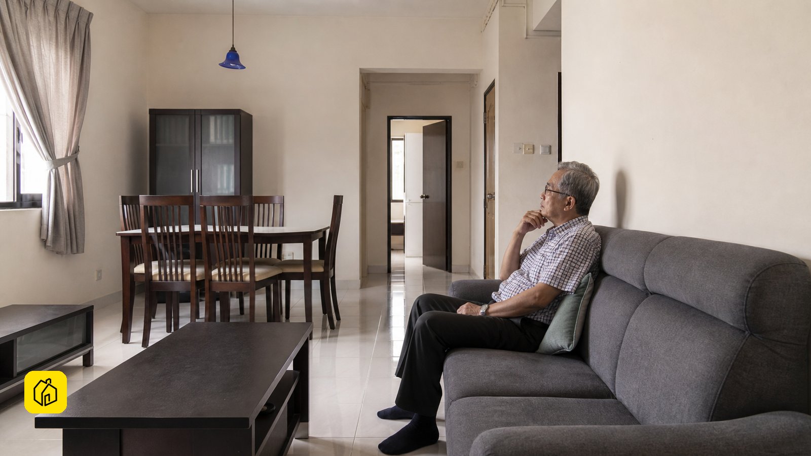 Malaysian landlord checking a family-sized Dutamas condominium living and dining room before a long-term tenancy.