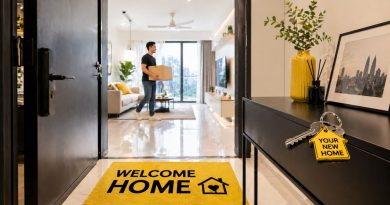 A bright and airy Malaysian apartment interior visualizing the frictionless entry of zero deposit rental with a yellow welcome mat and keys on a table