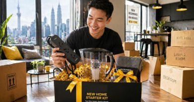 A wide-angle, bright photo of a tenant in a modern Malaysian studio unboxing a practical housewarming gift set, symbolizing a perfect move-in experience in 2026