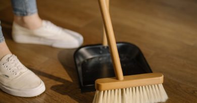 A person sweeps the floor