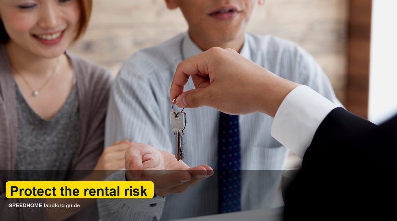 Landlord reviewing rental protection documents and property keys